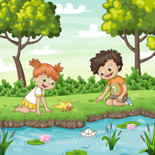 Fototapeta Naklejka Na Ścianę i Meble -  Two children play with a boat by al lake