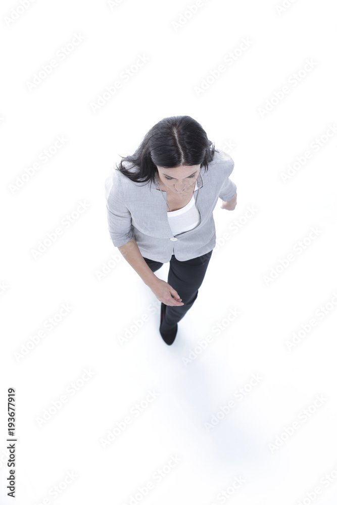 successful woman goes forward. in full growth. view from above. successful woman goes forward. in full growth. view from above.