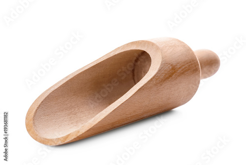 Wooden scoop on white background. Handcrafted cooking utensils