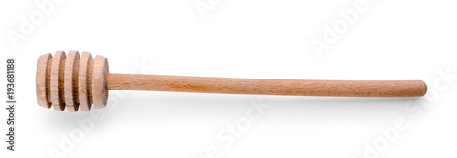 Wooden honey dipper on white background. Handcrafted cooking utensils
