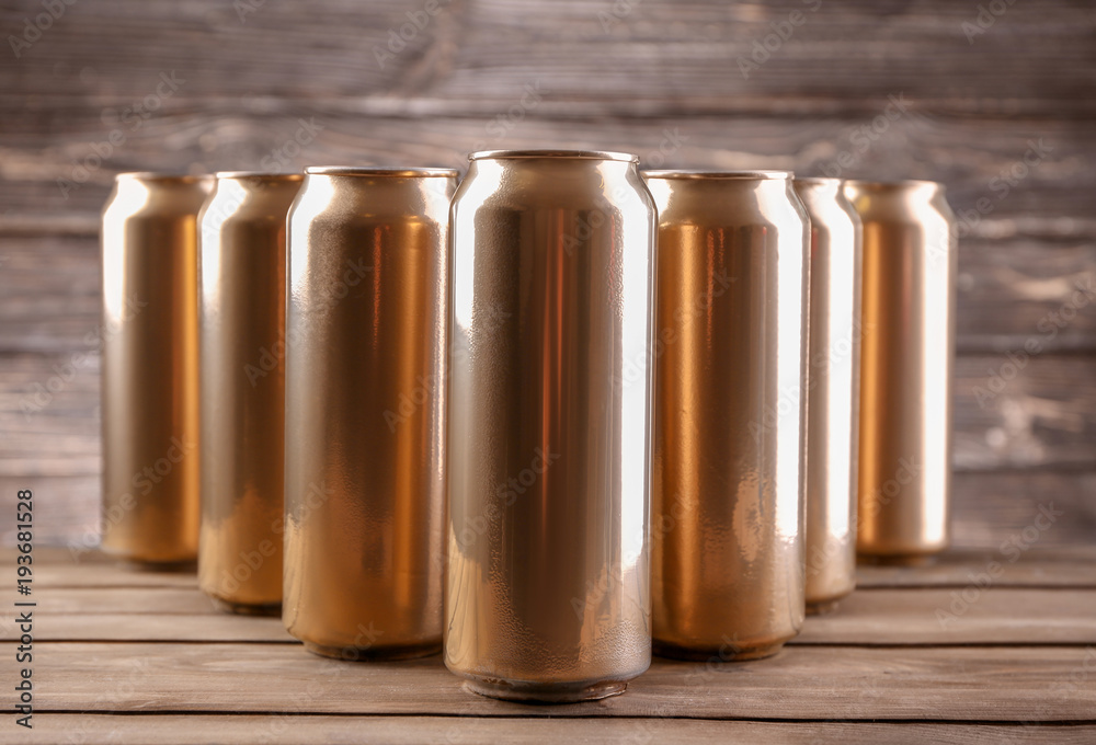 Cans of beer on wooden background Cans of beer on wooden background