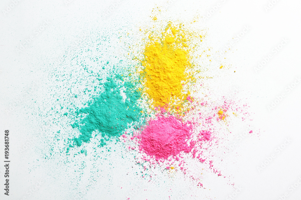 Colorful powders for Holi festival on white background