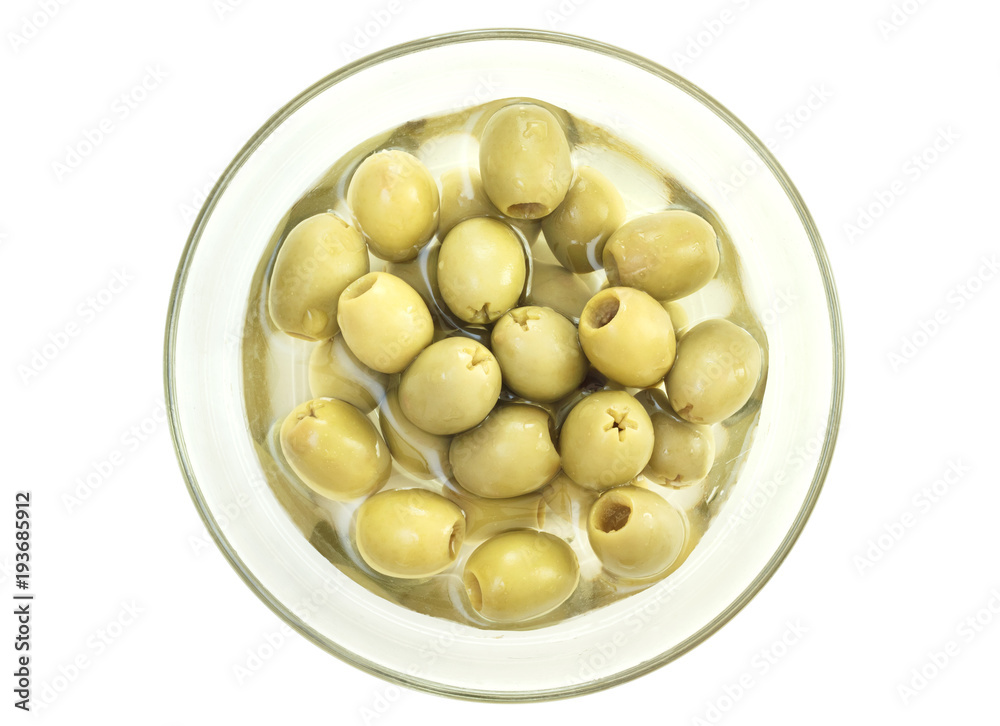 Top view glass bowl with green olive berries Top view glass bowl with green olive berries