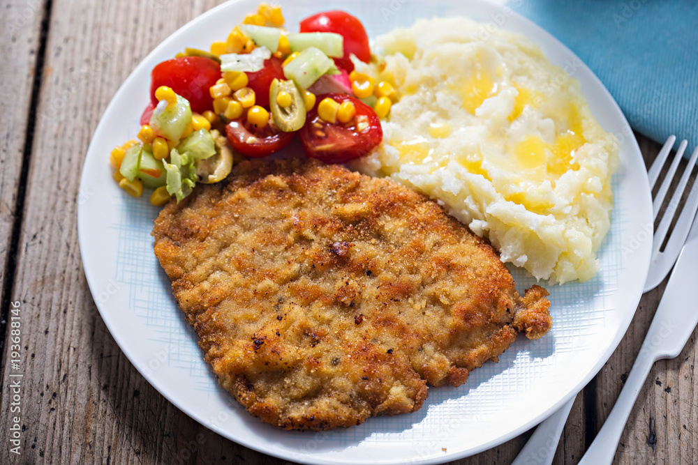 Polish breaded pork cutlet with mashed potatoes and salad Polish breaded pork cutlet with mashed potatoes and salad