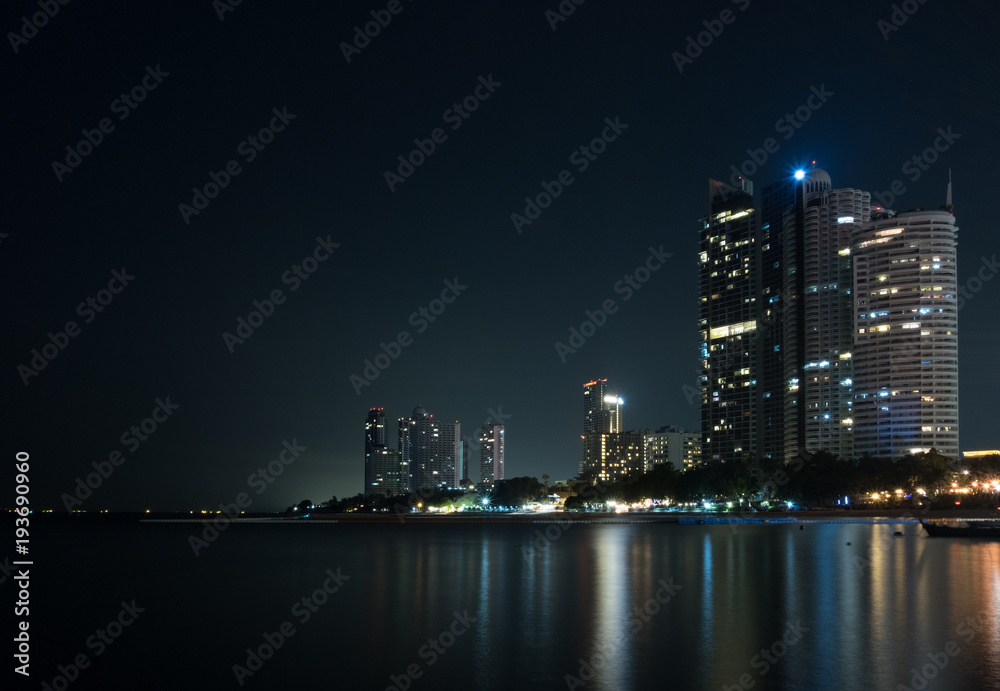 A long exposure of nigh cityscape at the Thailand beach.