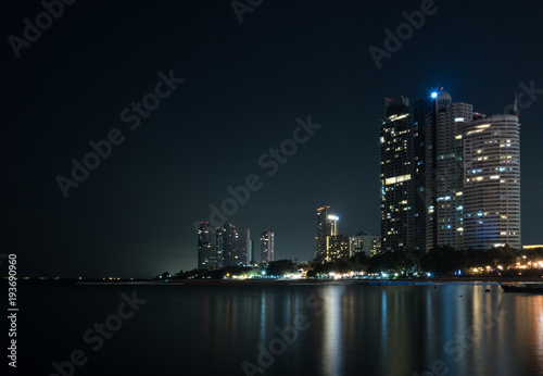 A long exposure of nigh cityscape at the Thailand beach.