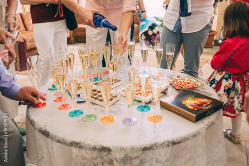 wedding table. champagne with sweets.