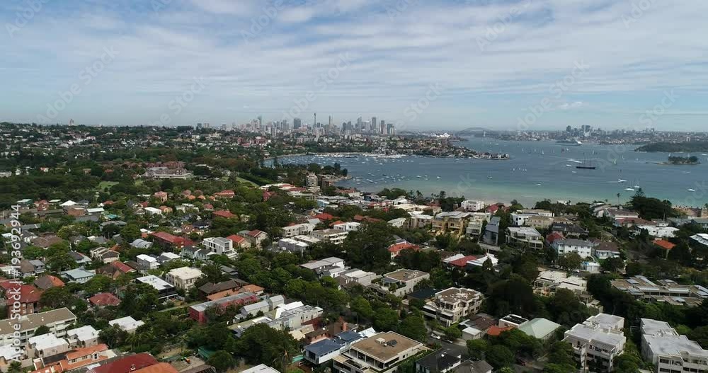 Wealthy suburbs of Sydney on Harbour shores – Rose Bay, Vaucluse, Dover Heights in view of Sydney city CBD landmarks and Harbour Bridge.
Wealthy suburbs of Sydney on Harbour shores – Rose Bay, Vaucluse, Dover Heights in view of Sydney city CBD landmarks and Harbour Bridge.