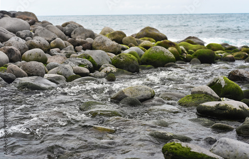 Group of stones near Atlantic ocean coast.