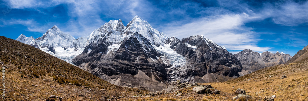 Fototapeta premium On the Huayhuash alpine circuit, facing the awesome Siula Grande and its west face. Jo Simpson had to crawl down this huge glacier when he broke his two legs.