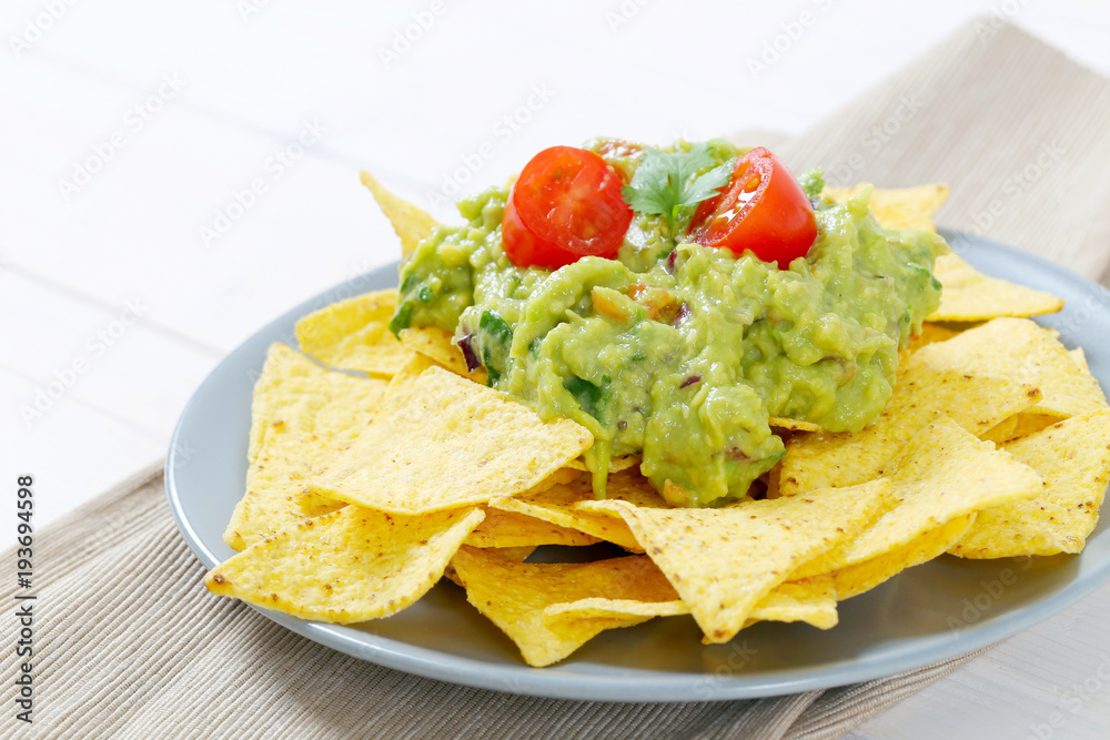 tortilla chips with guacamole tortilla chips with guacamole