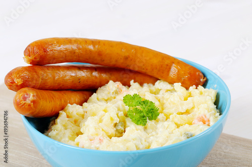 thin sausages with potato salad