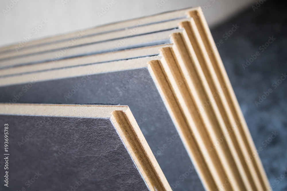 Samples of laminate and parquet board. Selection and types of floor coverings. Samples of laminate and parquet board. Selection and types of floor coverings.