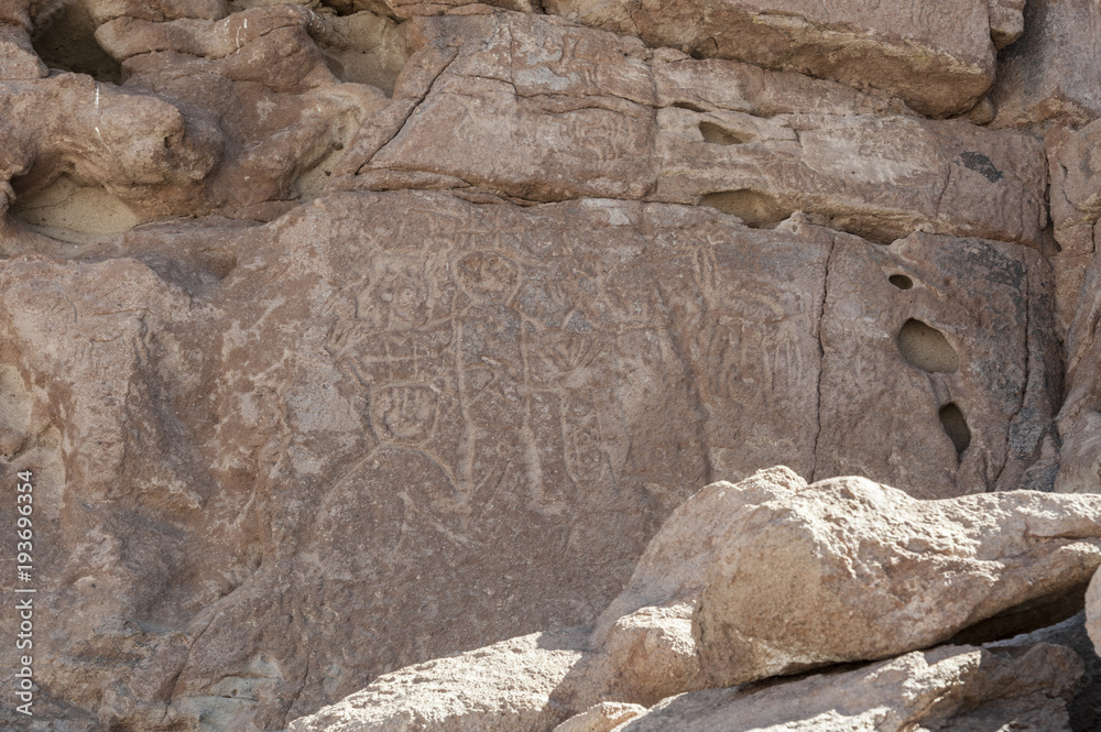 Ancient Petroglyphs on the Rocks at Yerbas Buenas in Atacama Desert in Chile Ancient Petroglyphs on the Rocks at Yerbas Buenas in Atacama Desert in Chile
