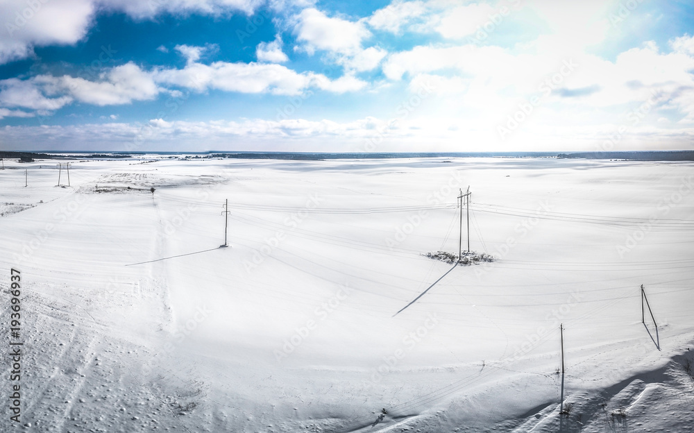 Winter fields - snowy landscape - electricity