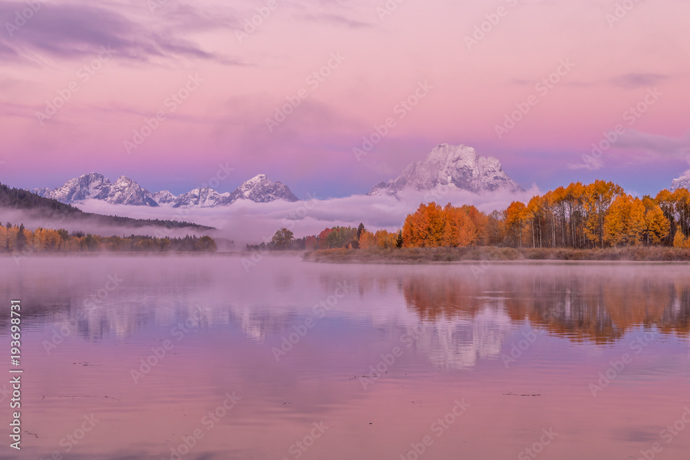 Scenic Sunrise Reflection in the Tetons in Autumn