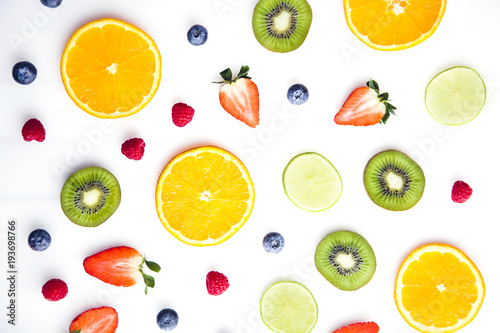 Sliced fruits on white background