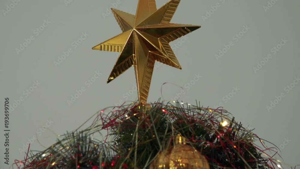 Closeup on the topper on a Christmas tree Closeup on the topper on a Christmas tree
