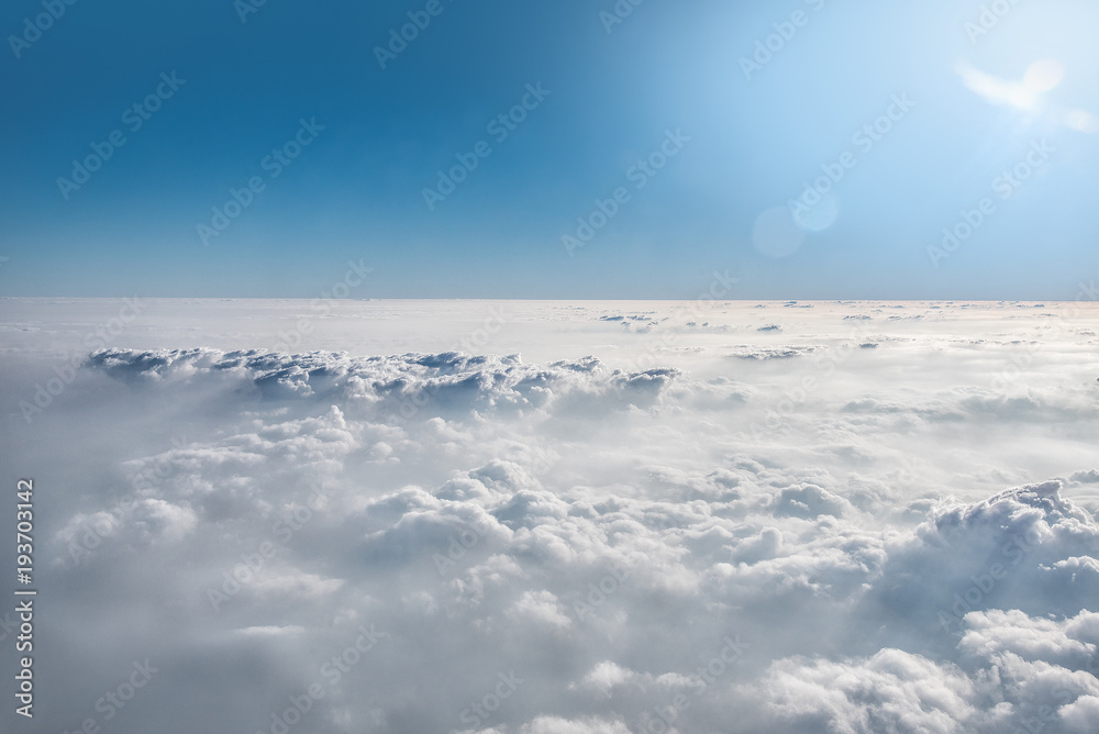Cloud view through airplane window.