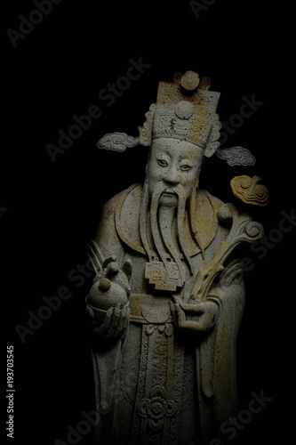 stone chinese nobility statue in thailand temple