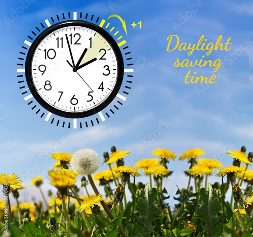 Daylight Saving Time. Change clock to summer time. photo