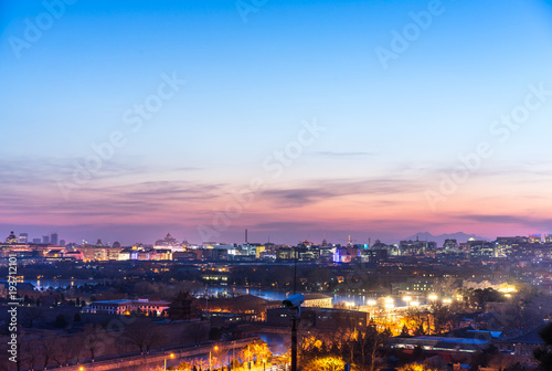 city skyline during sunset © THINK b
