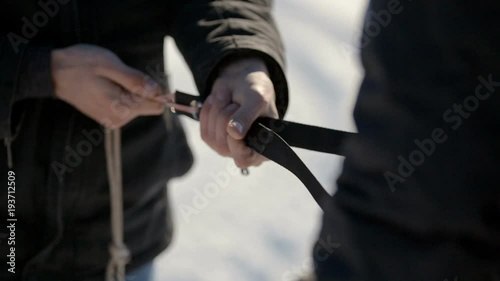 paratrooper equipment. preparation for paragliding competition. winter paragliding competition on a frozen lake near the city park. Ternopil Ukraine photo