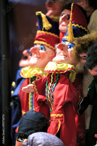 Group of thread marionettes in a theater