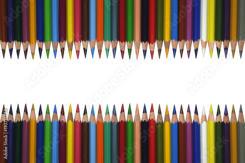 Row of pencils on white background