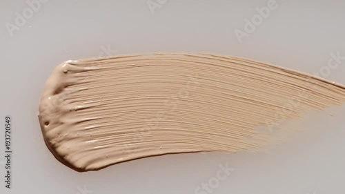 facial corrector with stick. top view corrector smudge texture of corrector. Macro makeup texture