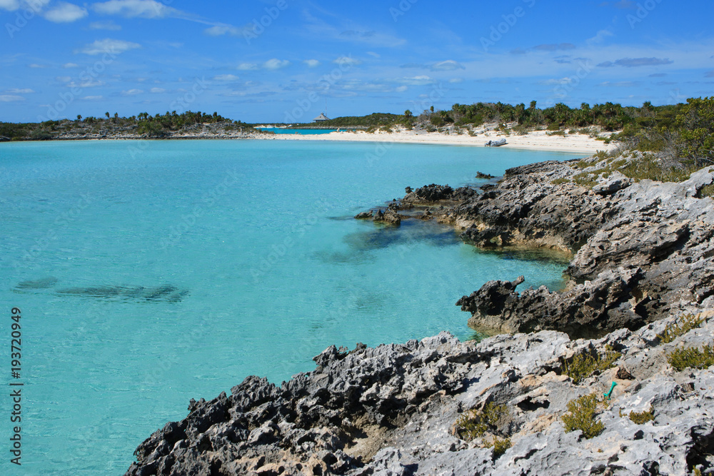 A small picturesque beach called Butterfly Beach located on Warderick Wells. The island is a part of the Exuma Land and Sea Park and is a protected National Park.