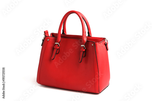 Red elegant female bag with two handles isolated on white background