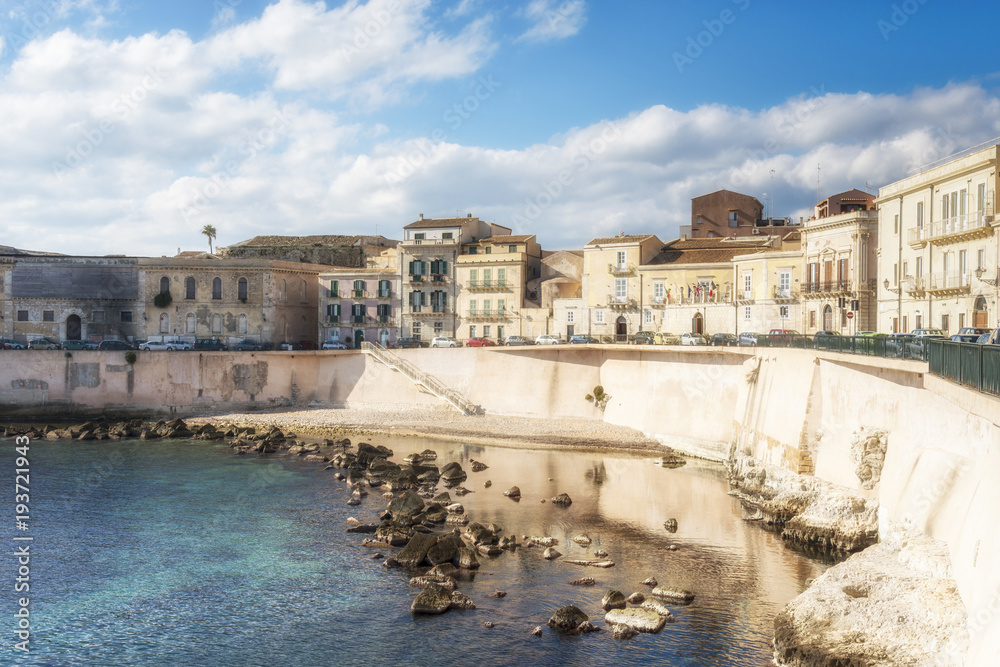 Sunny view of historical Ortygia island at the city of Syracuse, Sicily, Italy.