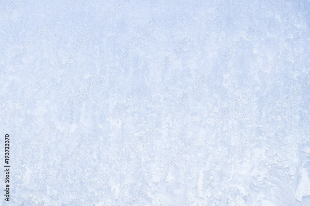 Winter frosty patterns on the frozen ice window Winter frosty patterns on the frozen ice window
