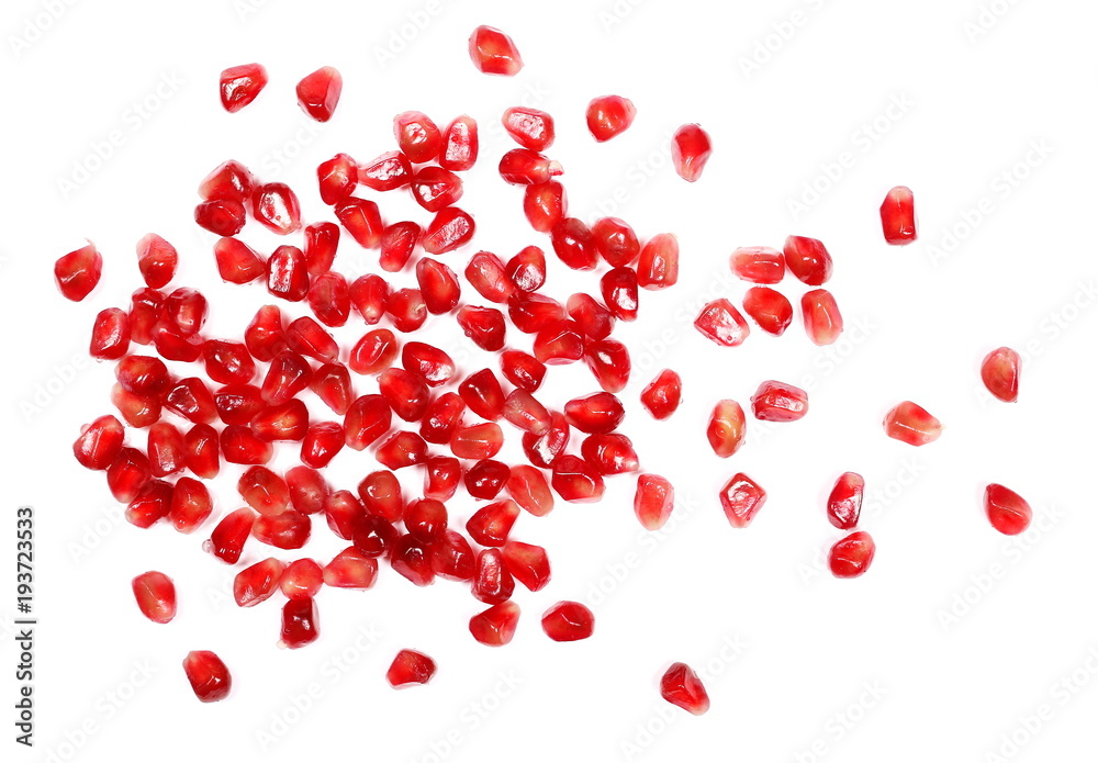 Pomegranate seeds isolated on white background, top view