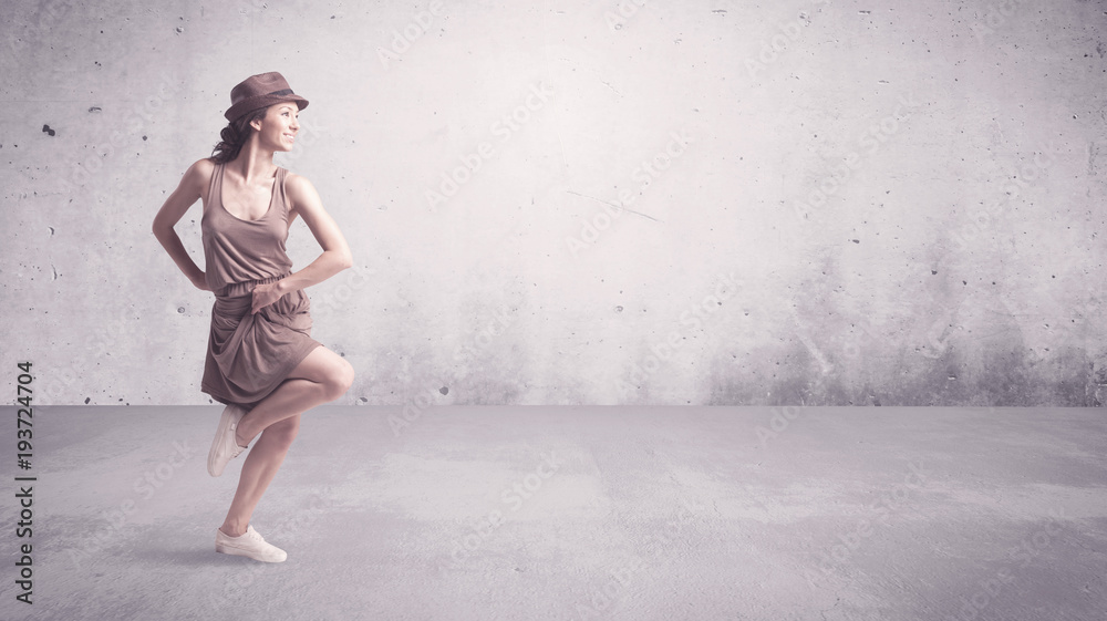 Pretty urban dancer with empty background Pretty urban dancer with empty background