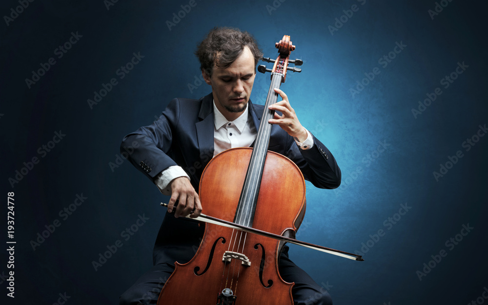Cellist playing on instrument with empathy