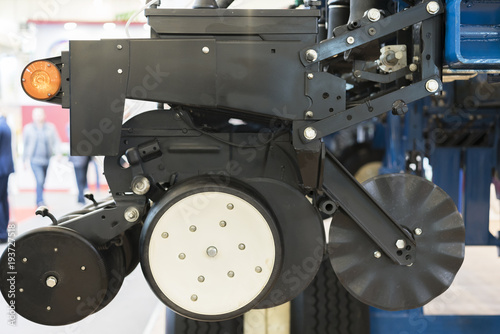 Close up of chain on gear on agricultural machine