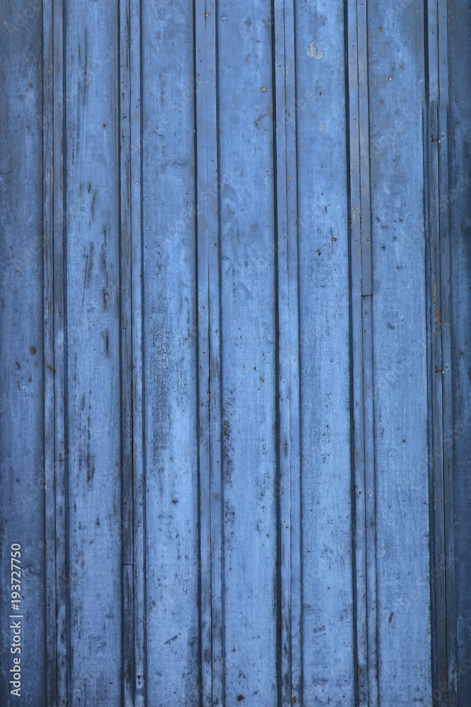 Holzwand aus Brettern in blau alt und verwittert Holzwand aus Brettern in blau alt und verwittert