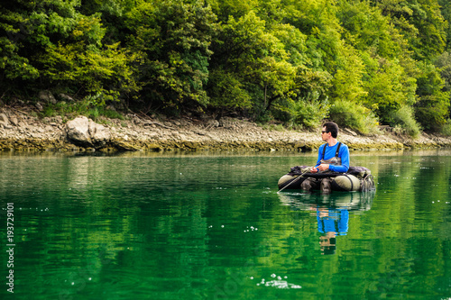Fisherman waiting for contact with trout, Slovenia © Miroslav