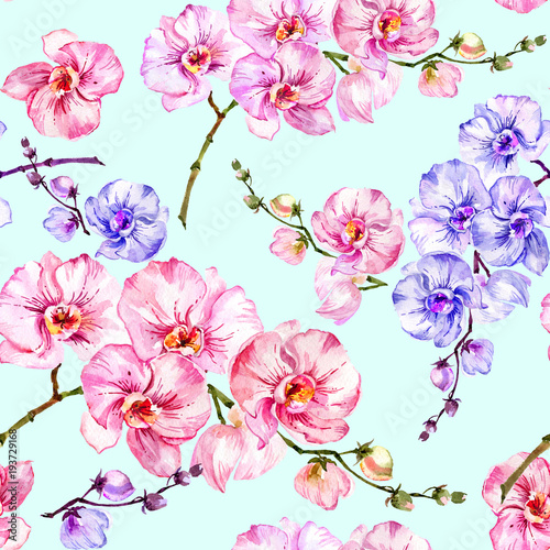 Blue and pink orchid flowers on light blue background. Seamless floral pattern. Watercolor painting. Hand drawn illustration.