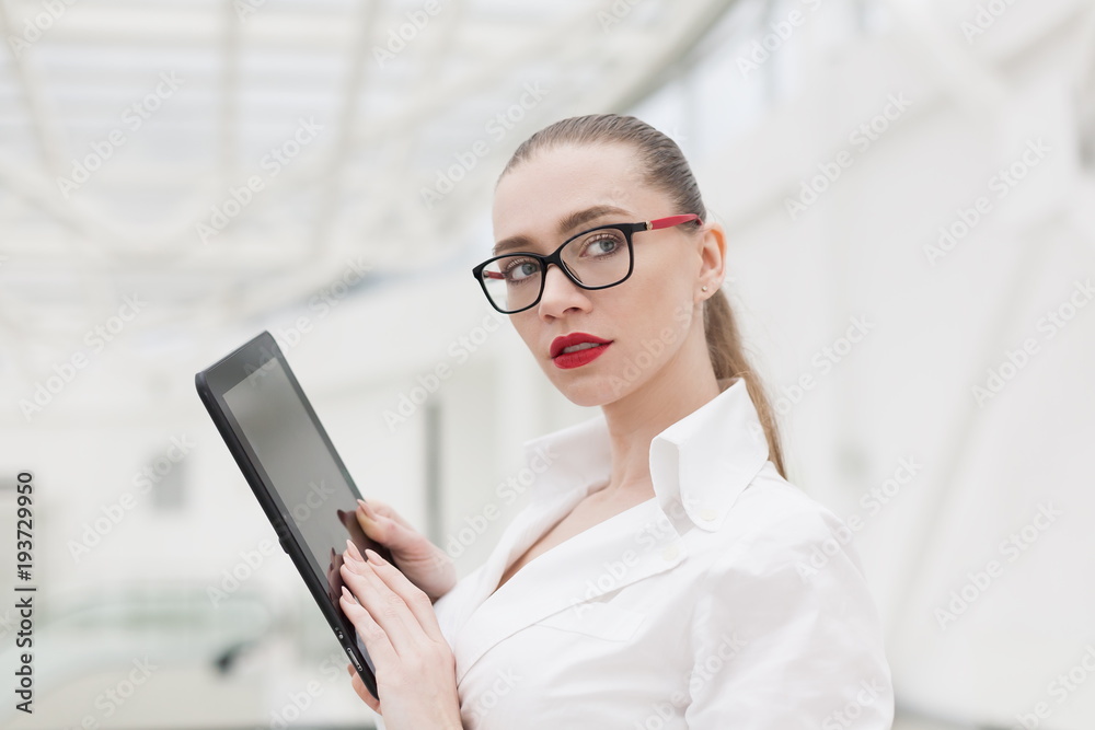 White blouse, tablet, eyeglasses, serious White blouse, tablet, eyeglasses, serious