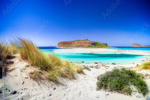 Fototapeta Naklejka Na Ścianę i Meble -  Amazing view of Balos Lagoon with magical turquoise waters, lagoons, tropical beaches of pure white sand and Gramvousa island on Crete, Greece