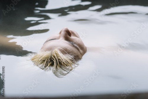 Woman relaxing in hot spring © davidaguerophoto