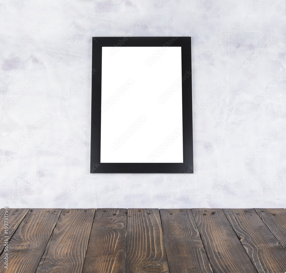 Blank black picture frame and wooden floor and grunge background Blank black picture frame and wooden floor and grunge background