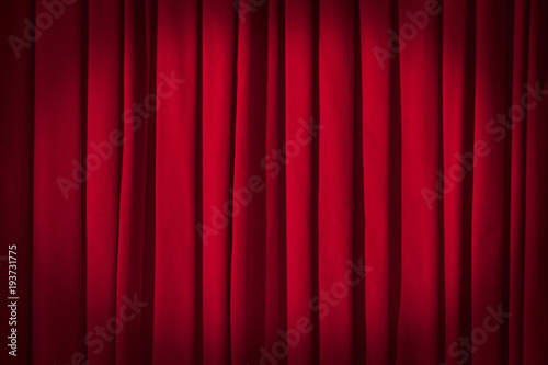 Red curtain theater background with folds, shadows and highlights.