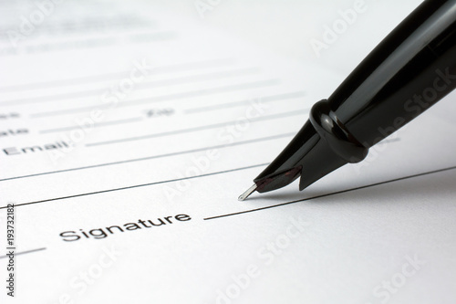 put a signature on an contract waiting to be signed