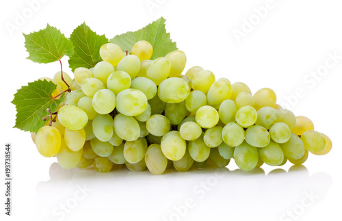 Fresh bunch of green grapes with leaves isolated on white background