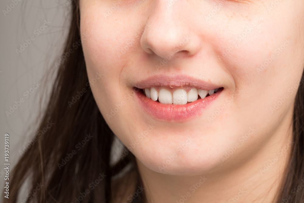 Woman mouth smiling with white teeth Woman mouth smiling with white teeth