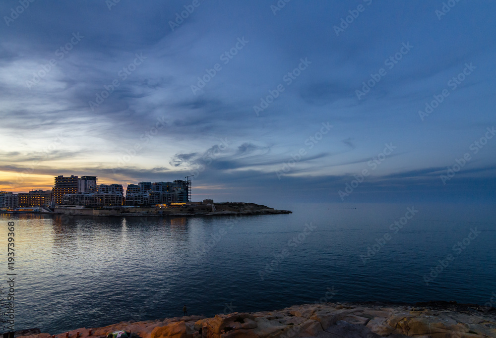 Sunset over new constractions in Sliema, Malta